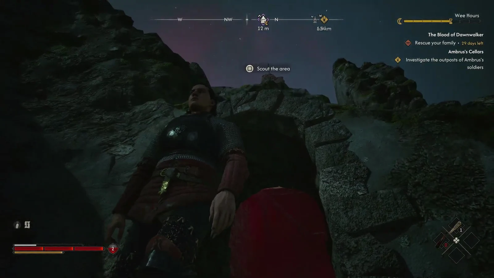 The Scout the area button prompt appearing on screen at a rocky vantage point