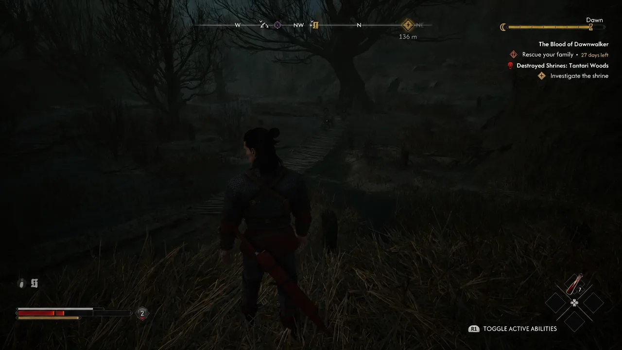 Coen running along a wooded path with the Investigate the shrine objective tracked on screen