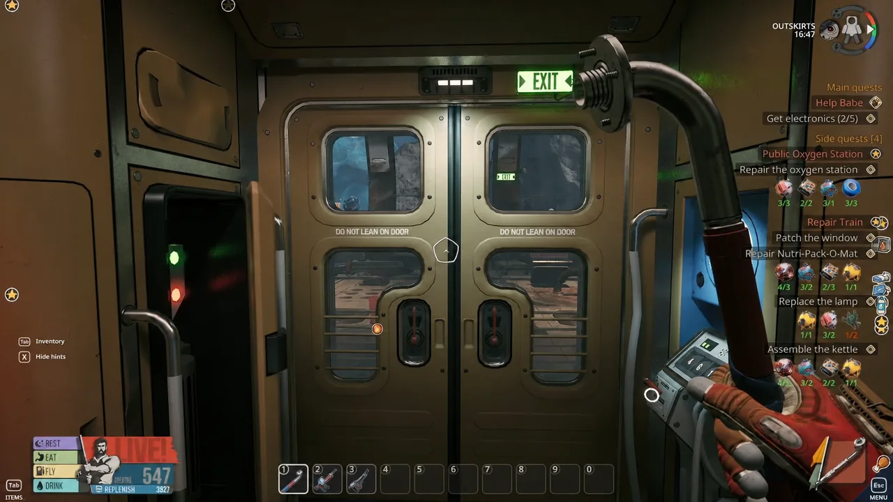 Player reticle centered on the station EXIT door before heading outside into space