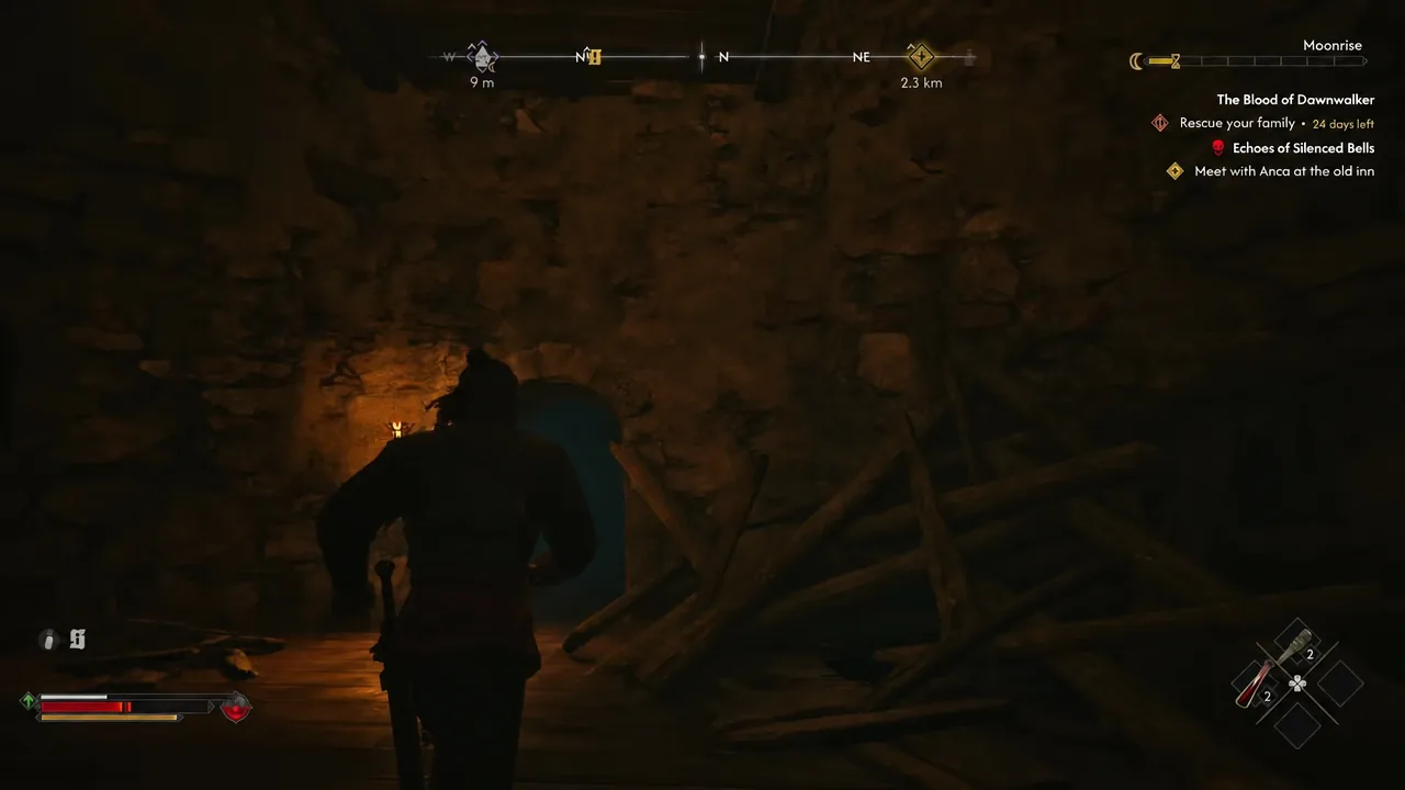 Night gameplay in a cave with the Rescue your family objective and day counter shown in the quest tracker