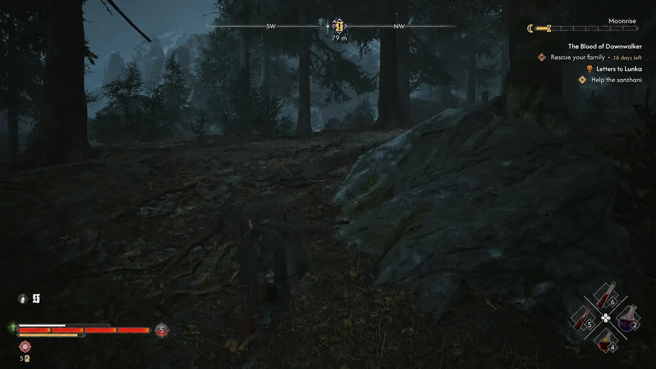 Coen running through forest with a compass marker showing 79 metres to the objective