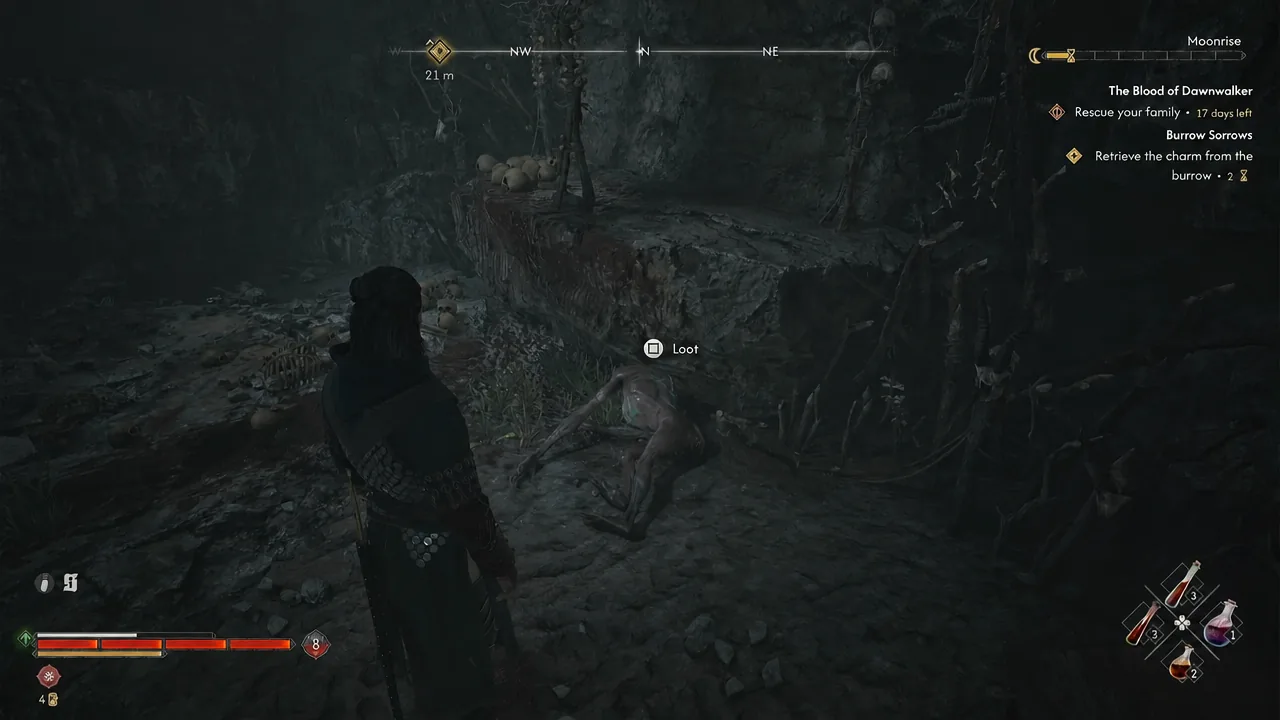 Loot prompt appearing over a body on the floor of the kobold burrow