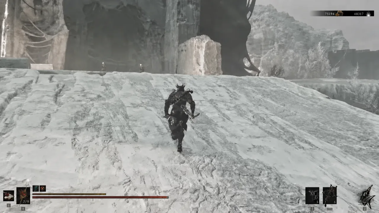 Armored character running up the snow-covered fortress platform where Sariel ambushes you