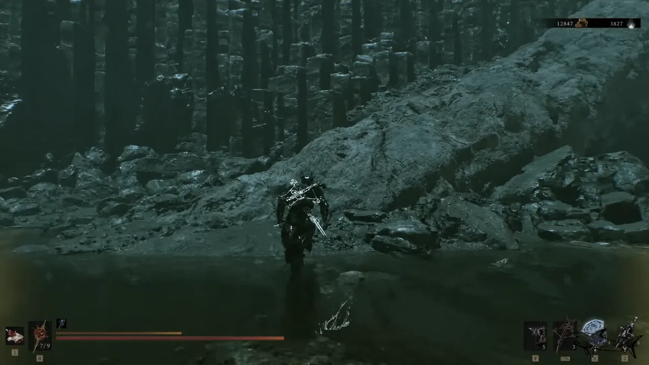 Wading through shallow water toward a basalt cavern between the two beacons