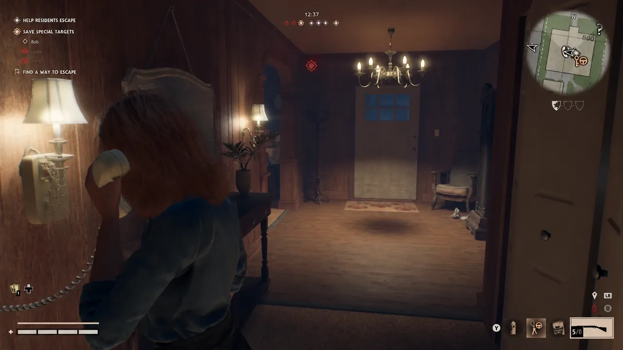 The FIND A WAY TO ESCAPE objective on the HUD while the player moves toward a hallway door