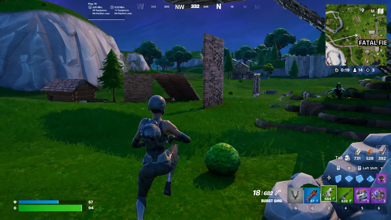 Player advances on wooden player-built walls with the Burst SMG out