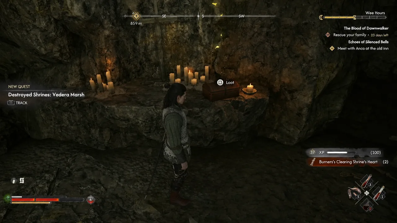 Loot prompt over a chest at the hidden altar deep inside the cave
