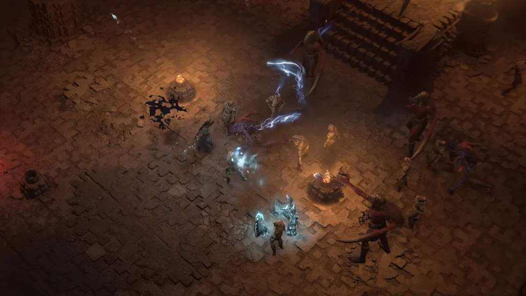 Diablo IV adventurers fighting demons in a ruined stone courtyard