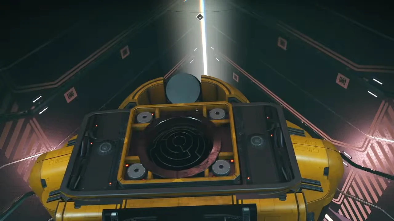 First-person view of an exposed circular mechanism on a yellow machine aboard the Corvette