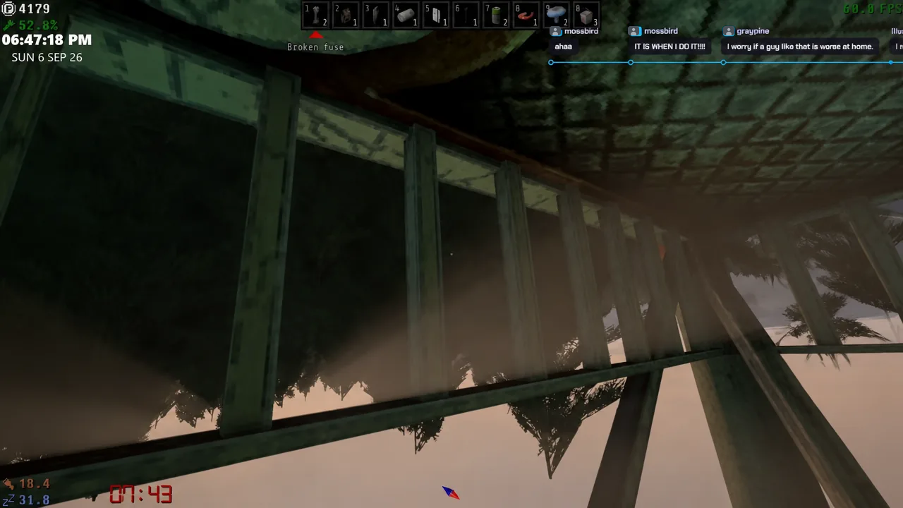 Player inventory bar with a Broken fuse selected beneath a raised satellite structure