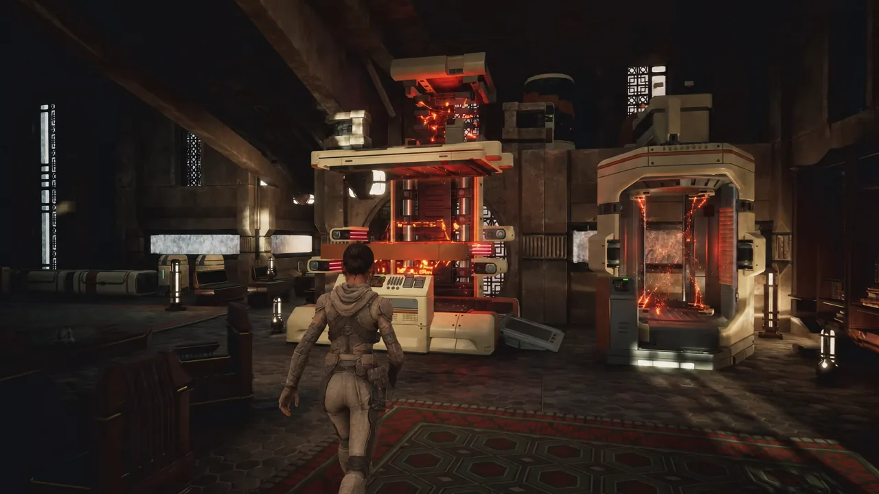 Player approaching a control console next to a glowing teleportation chamber inside a testing station
