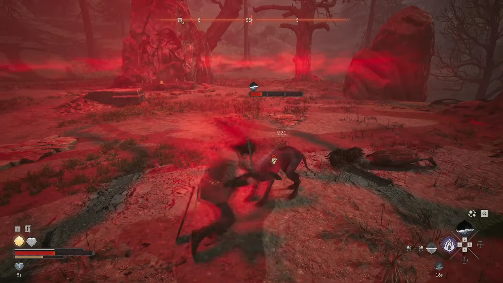Coen attacking a marked four-legged beast in the red-tinted Ancient Circle arena