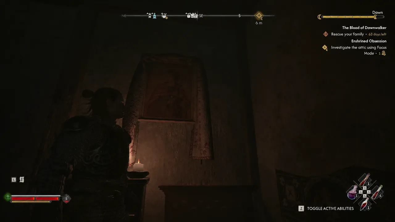 Candlelit wall inside the Curious House while the attic investigation objective is displayed