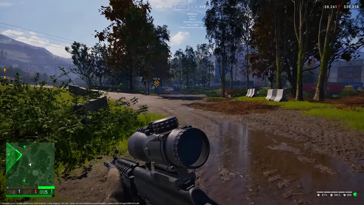 HUD showing a rifle aimed down a muddy path at a yellow objective marker 127 meters out