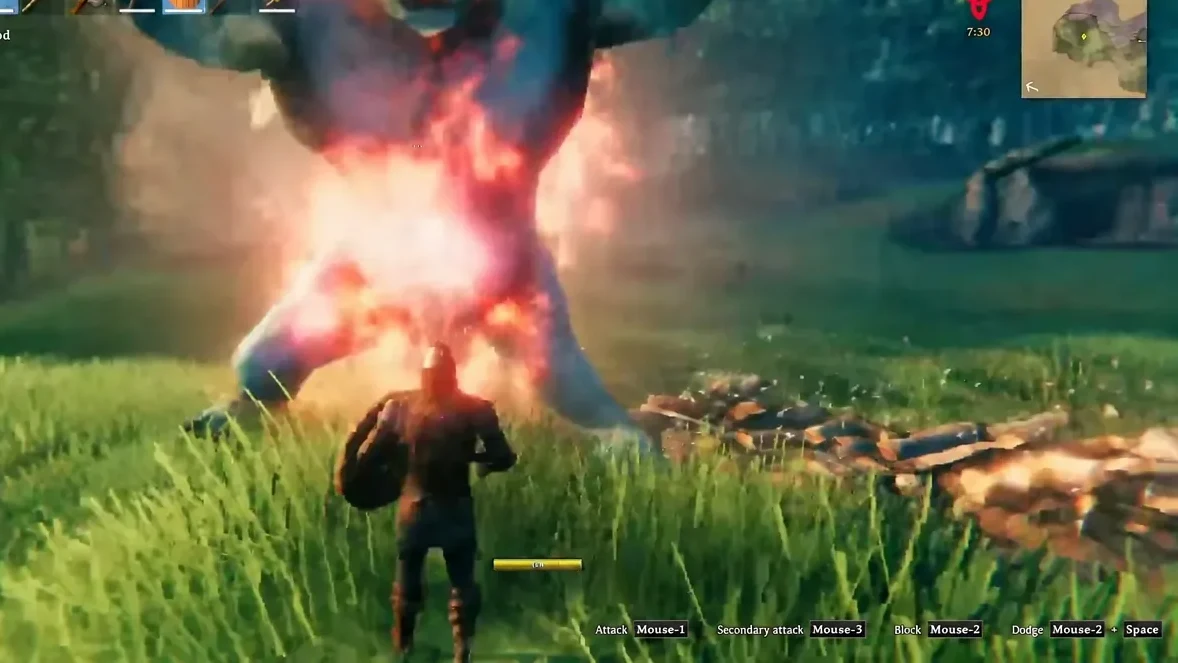 A player swings at a burning tree-like enemy with the Mouse-1 attack prompt visible