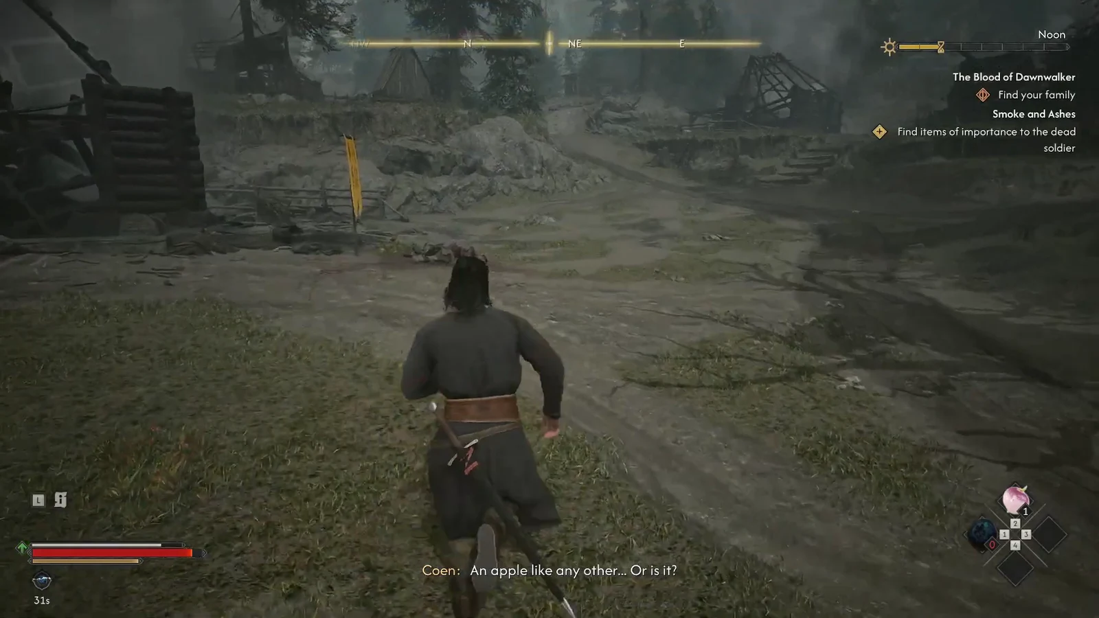 Coen runs through the ruined village with the Find your family objective tracked on screen