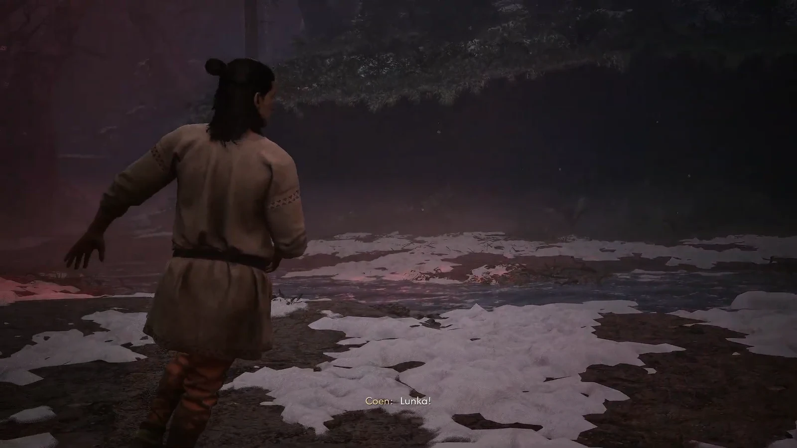 Coen crossing a snow-covered clearing while calling out for Lunka