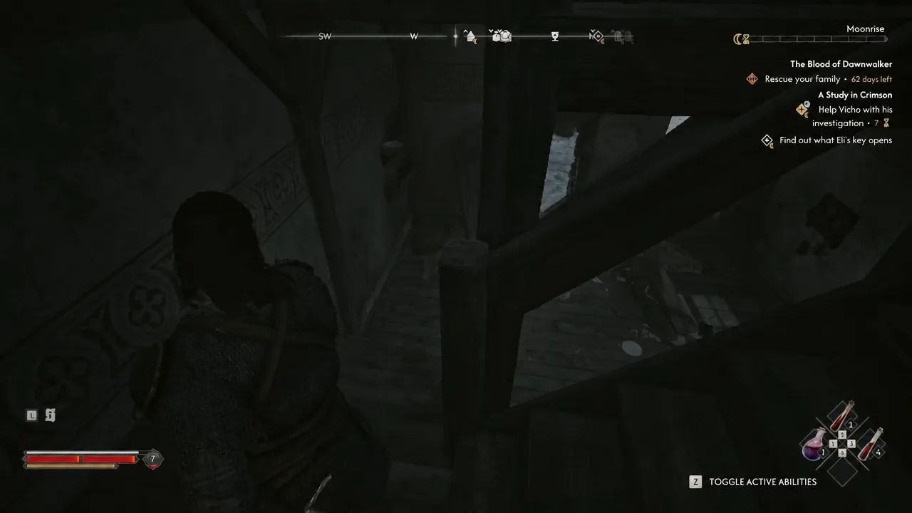 Coen searching the ground floor of the jeweller's house near the staircase for the hidden chest
