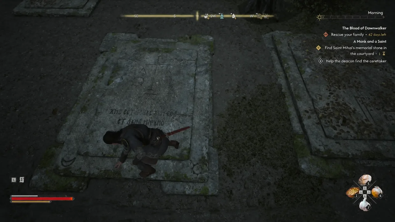 Coen brushing leaves from a courtyard gravestone to reveal the inscription beneath