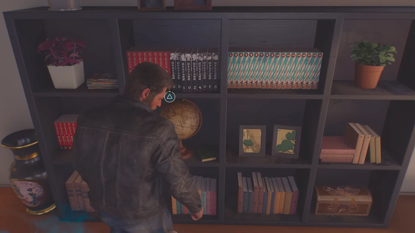 Triangle interact prompt lights up over a globe sitting on the shelves in Shiro's apartment