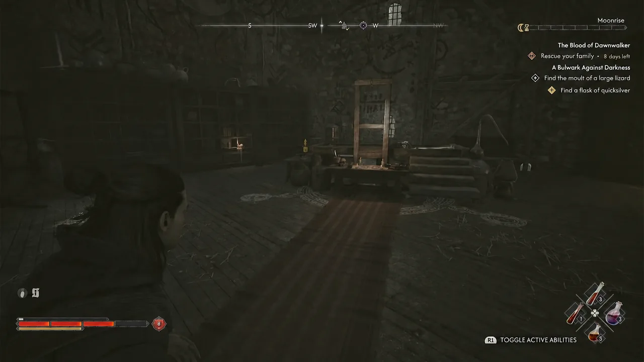 Interior of the tower's top floor with the quest tracker and ability toggle prompt on screen