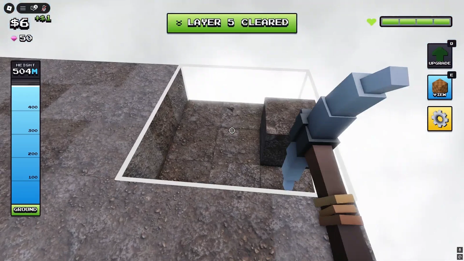 Player digging a ground block with the LAYER 5 CLEARED banner shown on screen