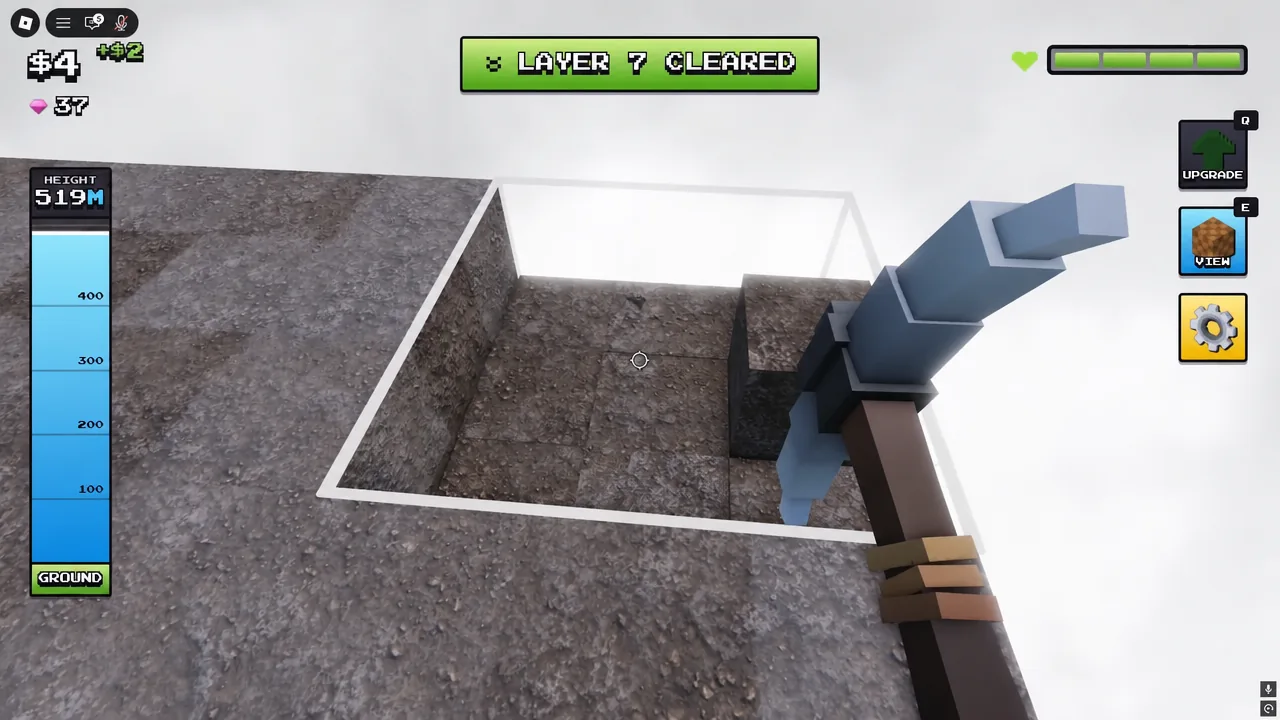 Player digging a ground block with the LAYER 5 CLEARED banner shown on screen
