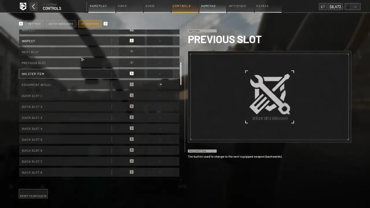 Controls Keybindings screen showing a selected action and its keyboard binding
