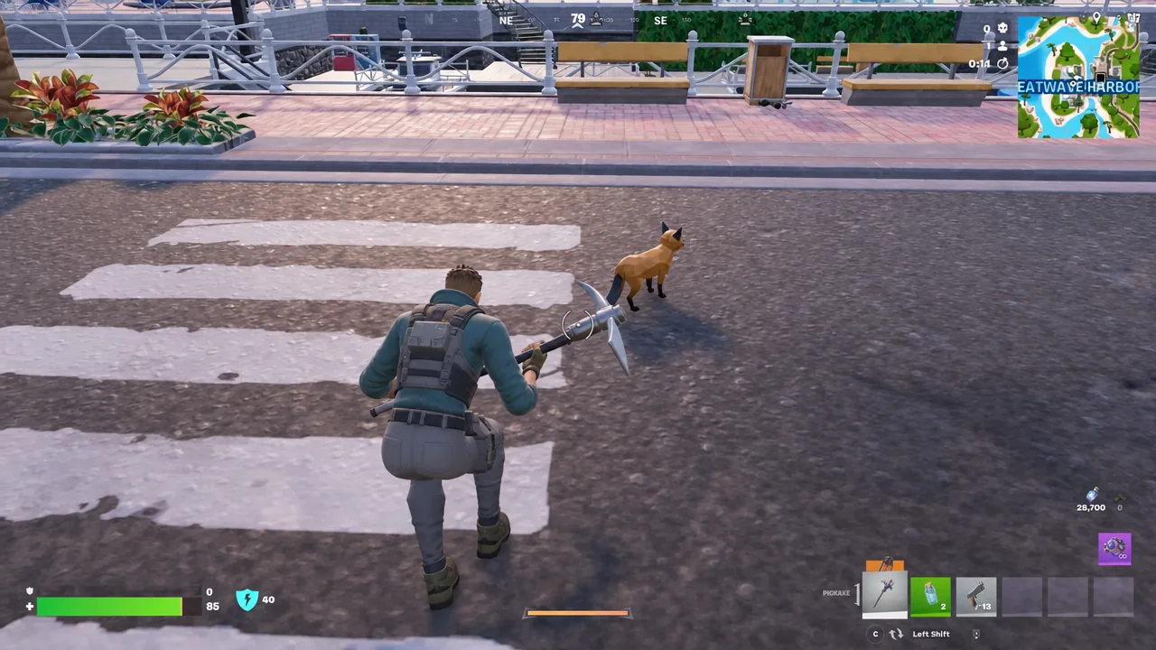 The cat settles into an idle sit when you stop moving and responds to emotes.