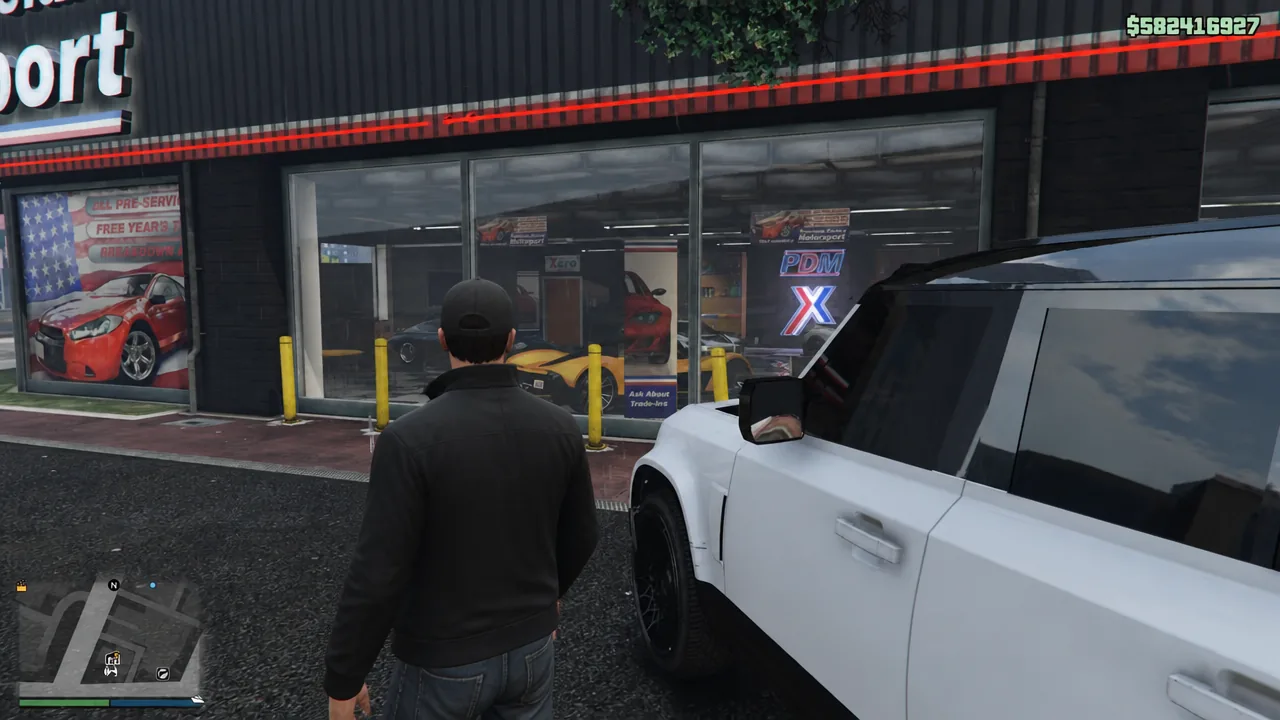 Player walking toward a Los Santos Customs entrance past a white SUV