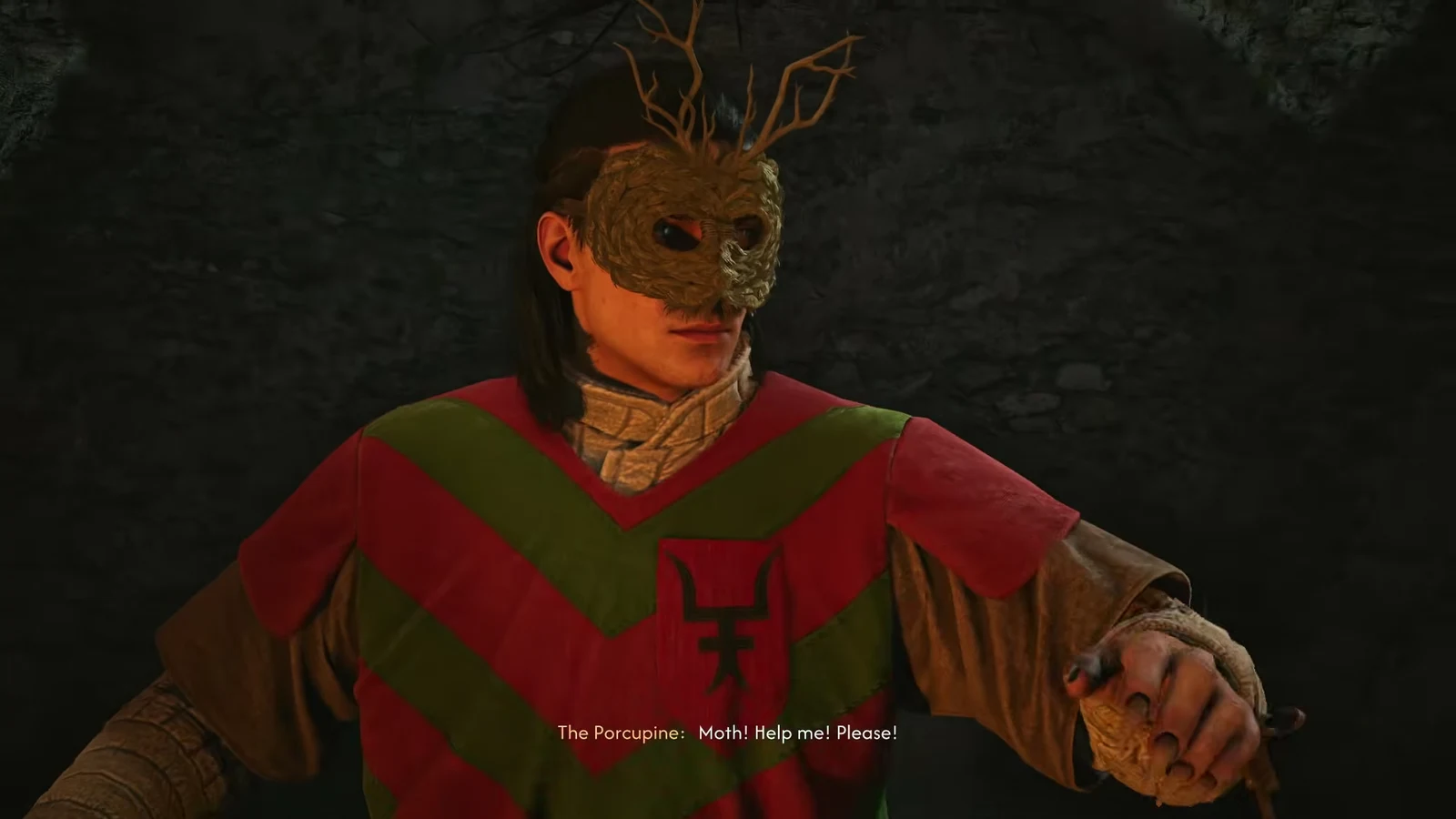 Masked contestant The Porcupine bound to the willow tree, begging Moth for help