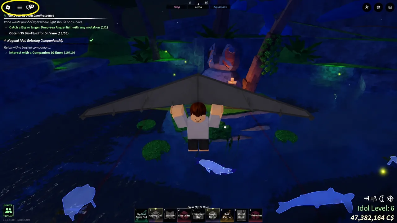 Elite Glider equipped in the hotbar as the player glides over open water toward the island