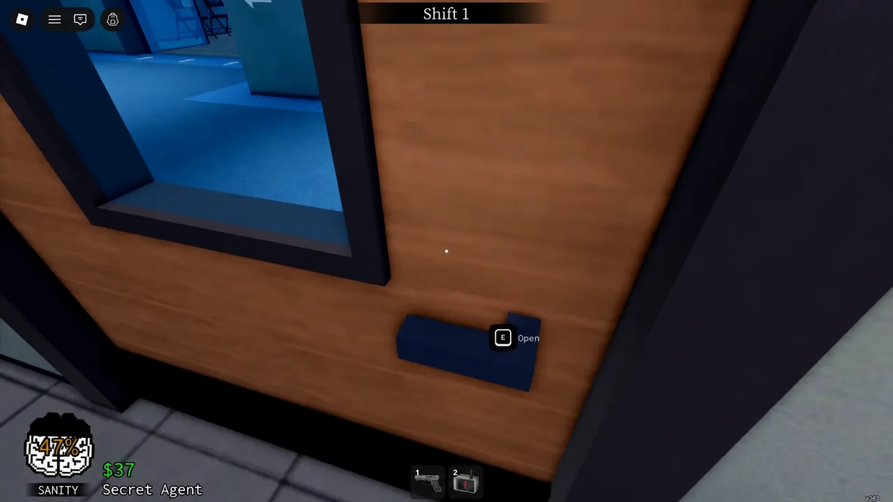Door handle in the hospital corridor showing the E Open interaction prompt during Shift 1