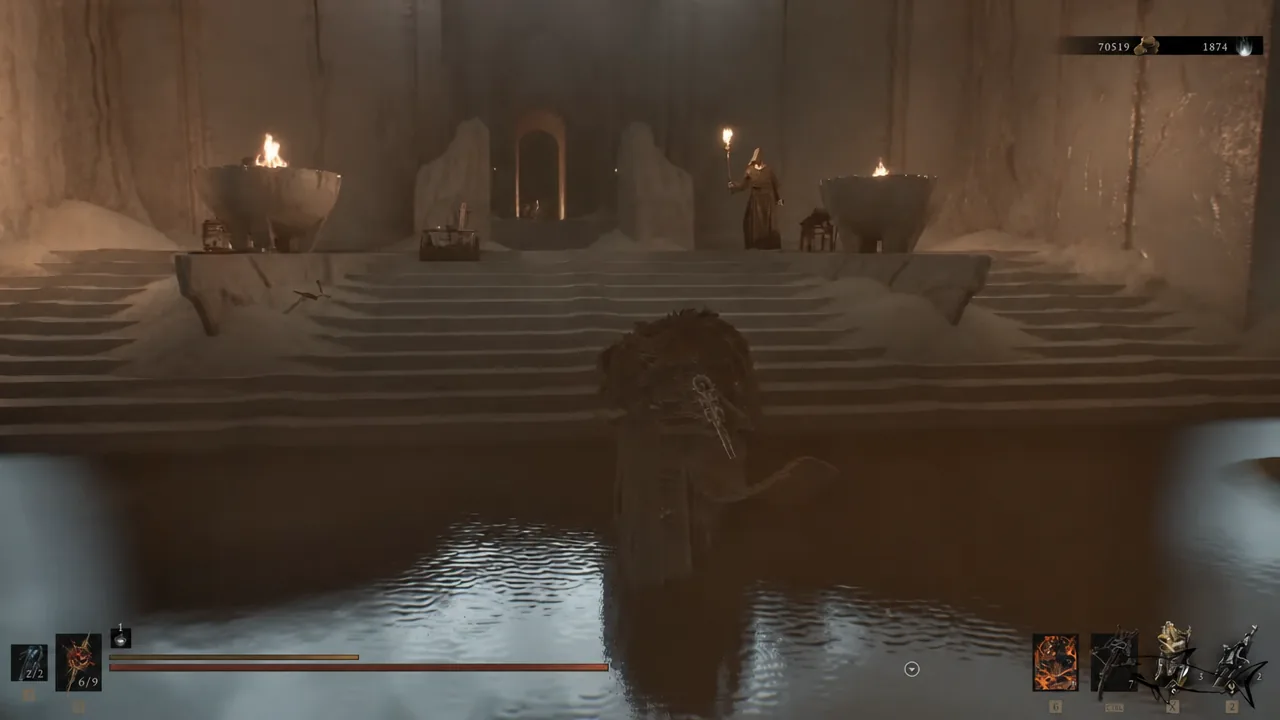 Player wading through shallow water toward a torchlit altar inside Marrow Keep