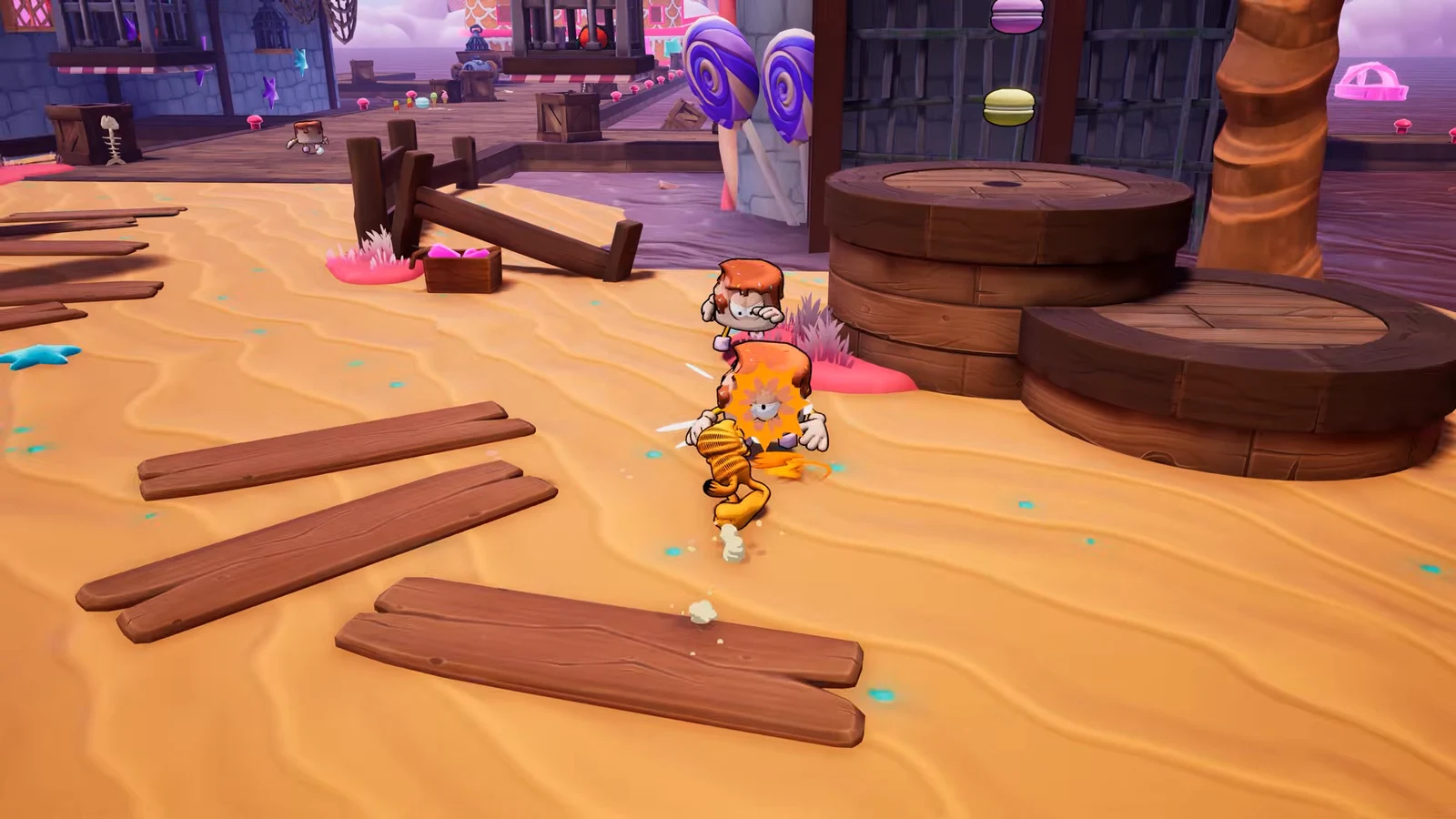 Garfield attacking an orange-haired opponent on a sandy level next to wooden platforms and barrels