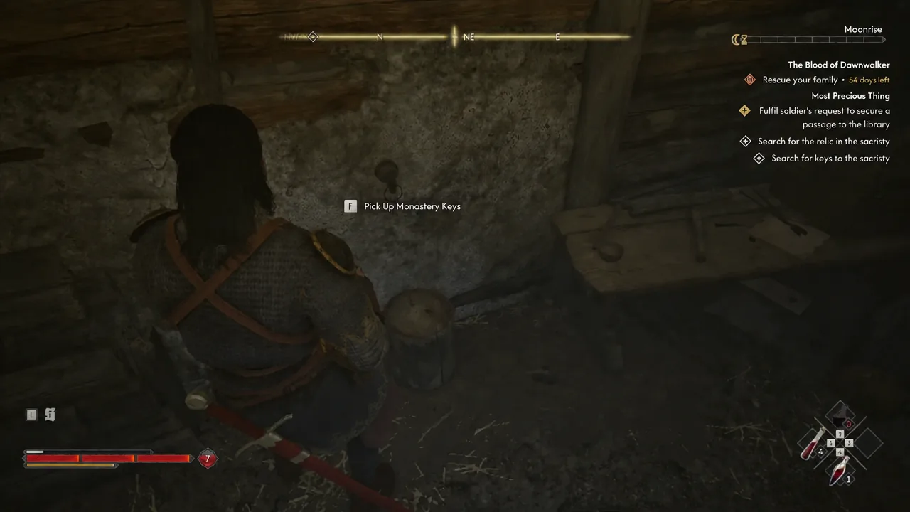The Pick Up Monastery Keys prompt with the F key shown on the interaction bar