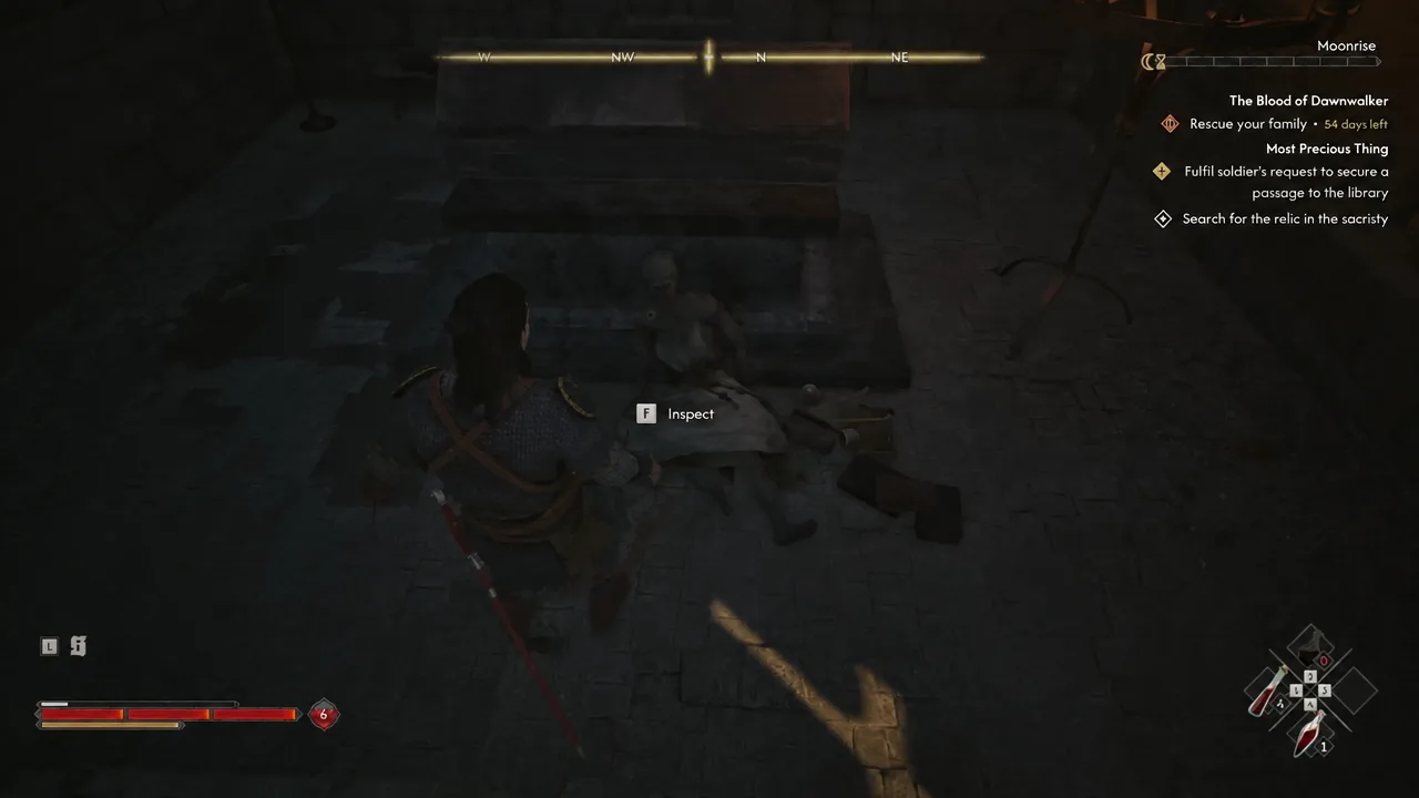 Inspect prompt appearing over the dead nun’s body inside the sacristy