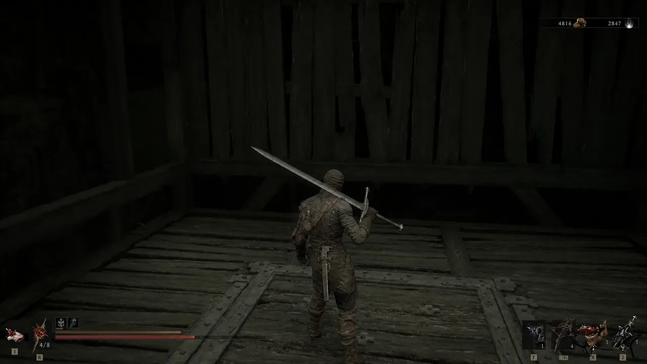 Armored Shell with a large sword standing on the dark wooden lift descending into the pit
