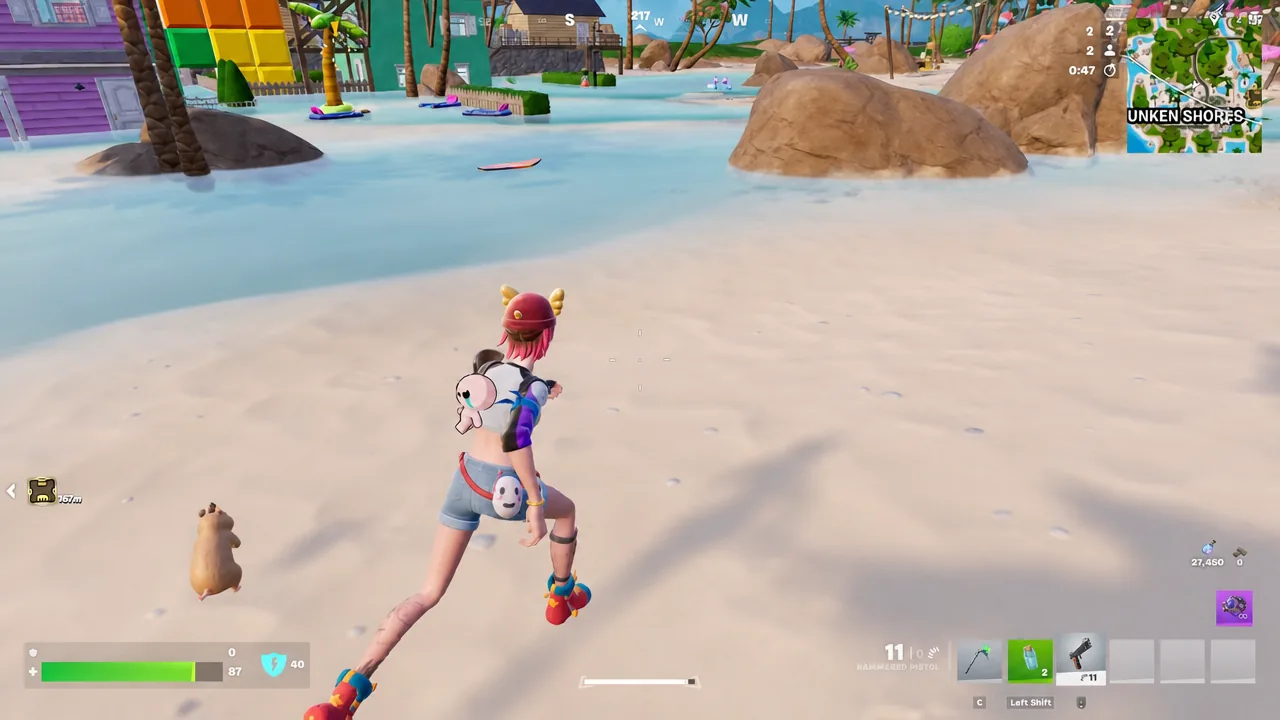 Fortnite player crossing a beach with a pistol equipped after looting