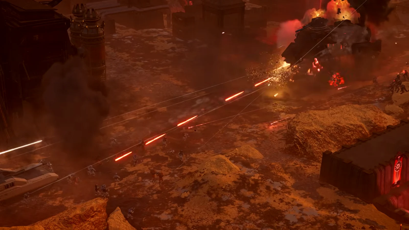 Two Helldivers standing together in heavy armor on the battlefield