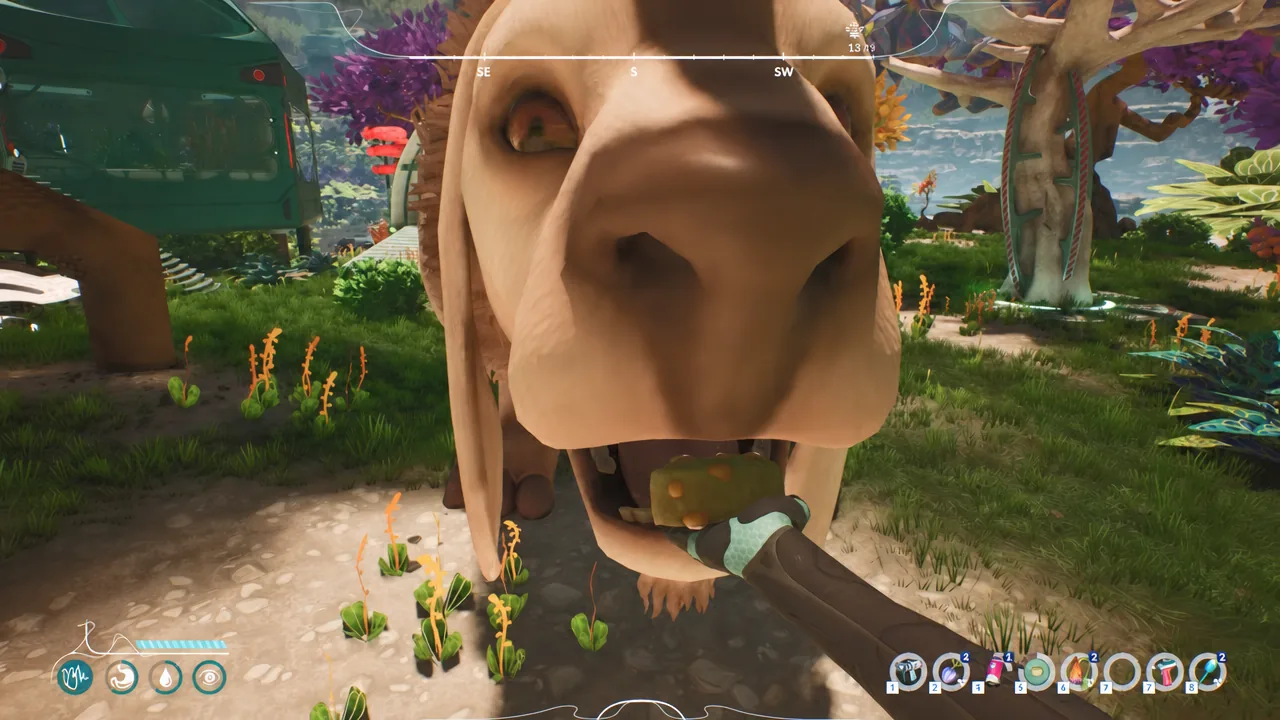Player offering a held food item to a large alien creature