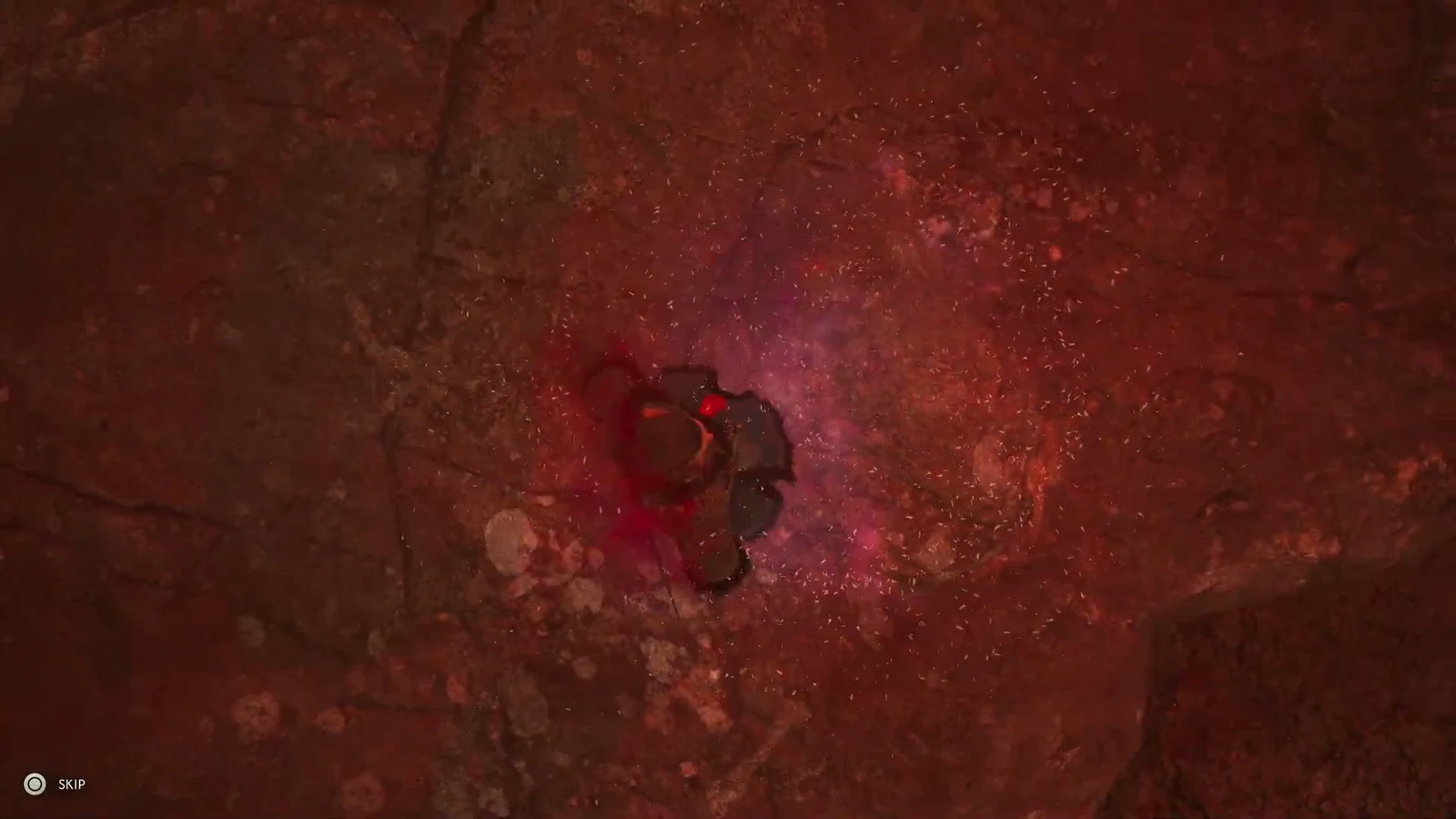 Red sparks swirl around a figure as the memory cutscene begins, with the SKIP prompt in the corner