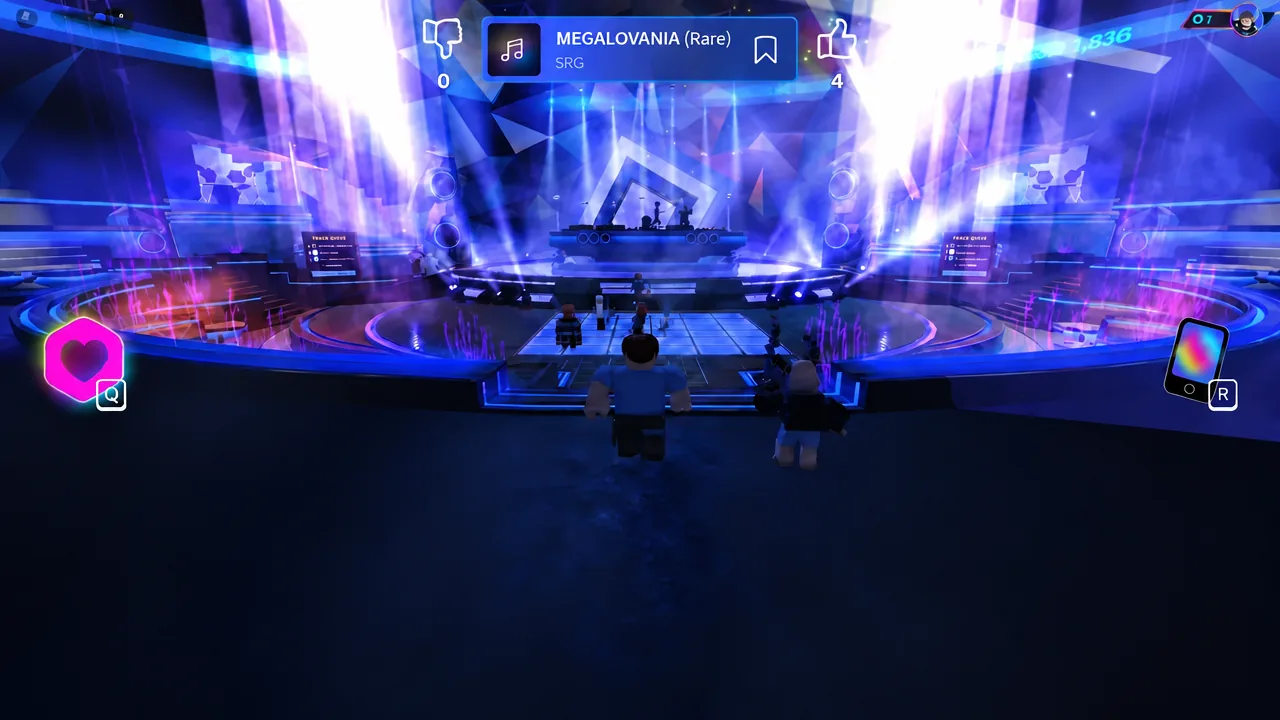 Concert screen inside The Block showing a highlighted rare track banner during the stage performance