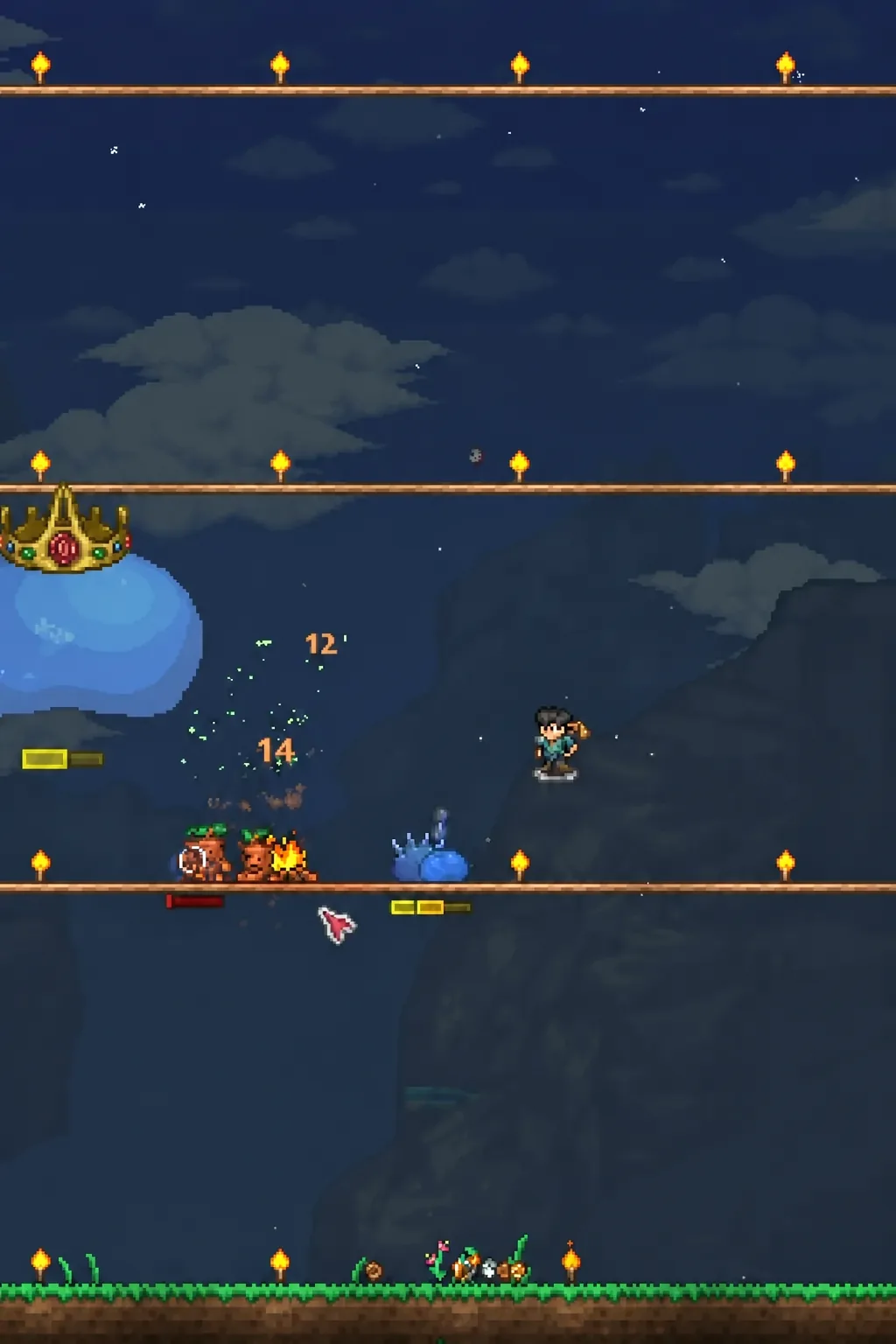 Terraria player fighting enemies on torch-lit wooden platforms with a minion nearby