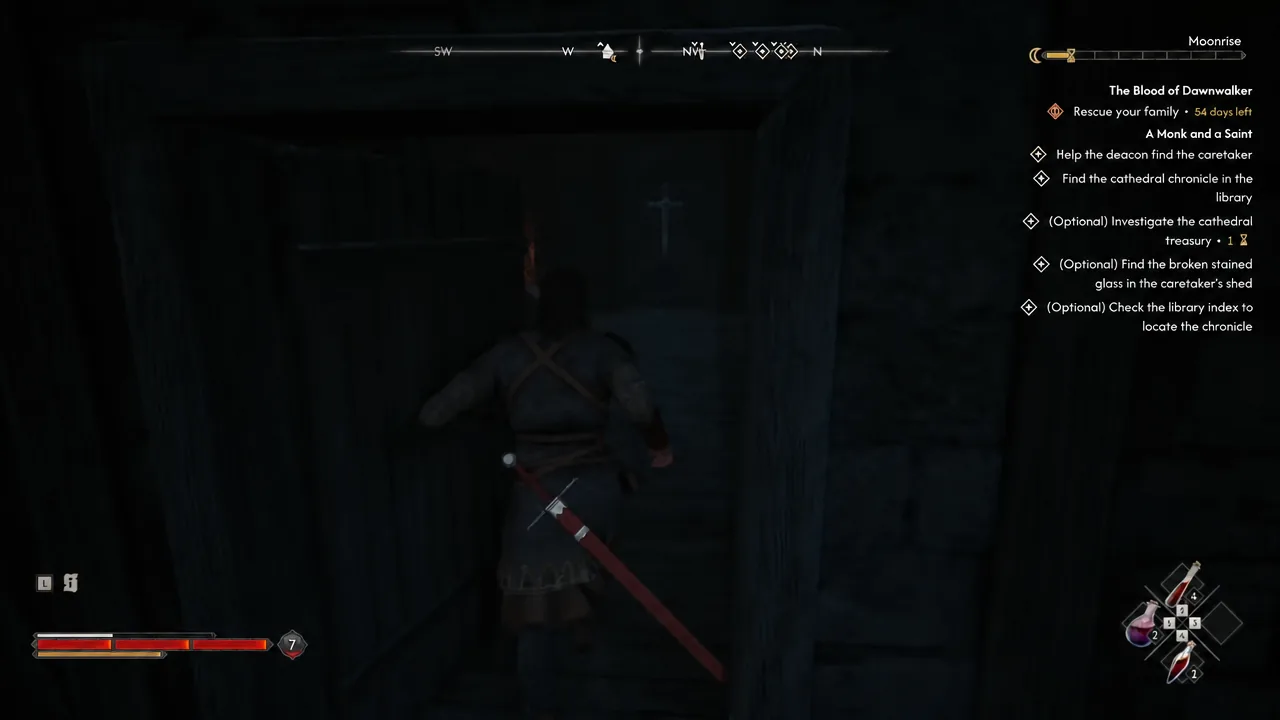 Coen stepping through the dark balcony doorway into the cathedral library