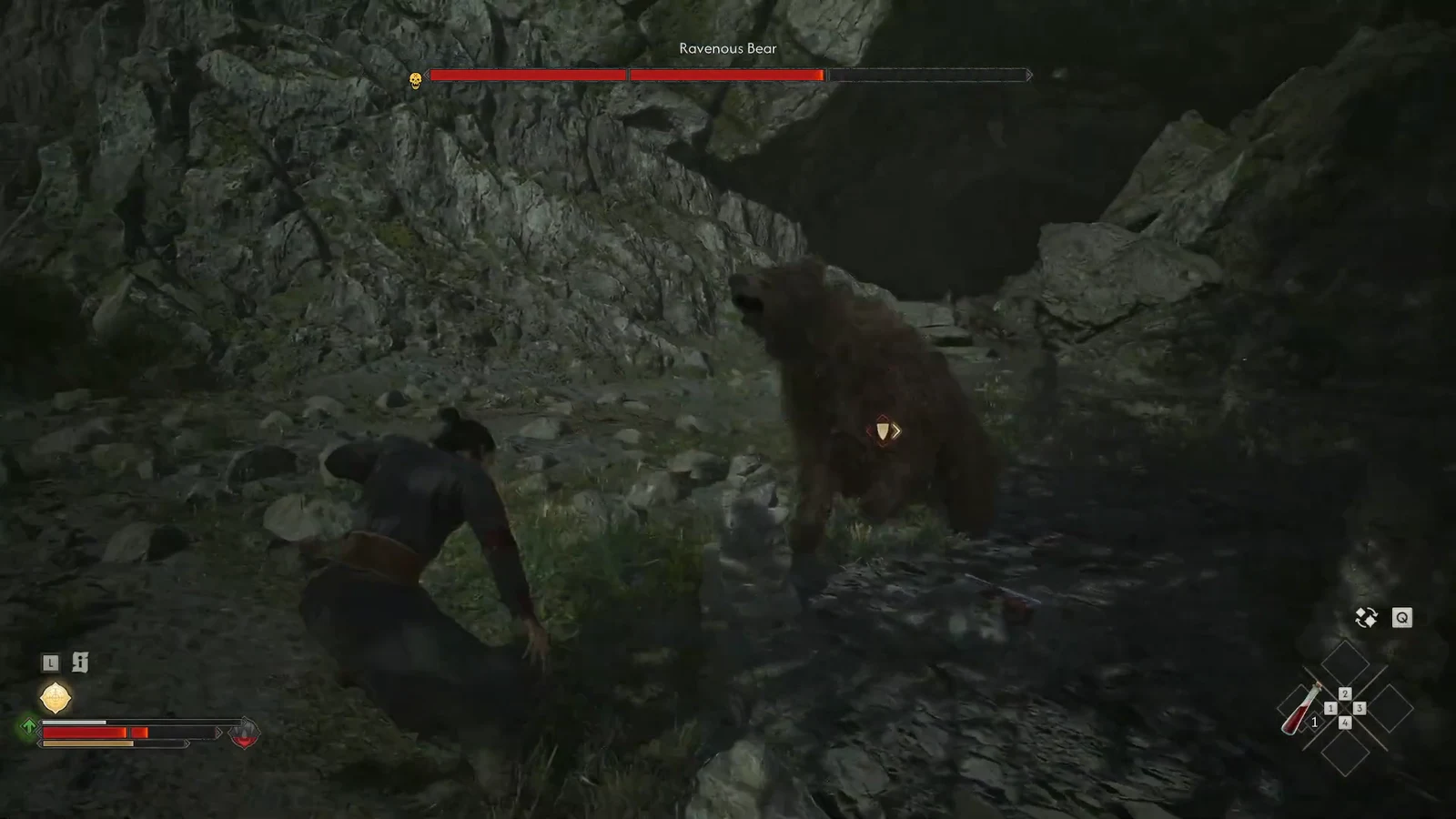 Coen faces the Ravenous Bear in a rocky pass with the boss health bar on screen