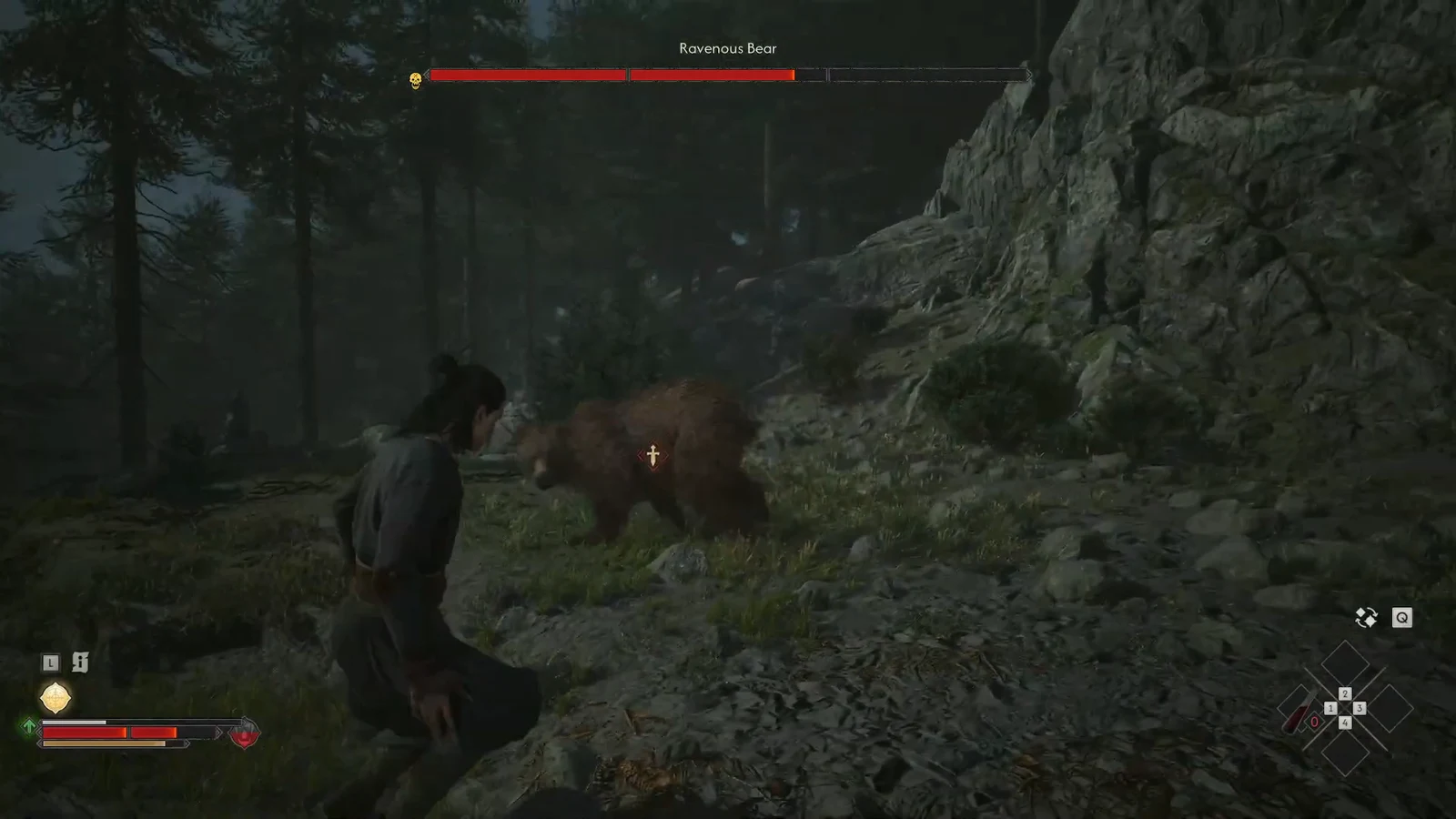 Combat view with the Ravenous Bear locked on and its boss health bar across the top of the screen