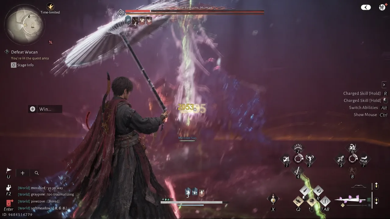 Gameplay screen during the second phase with the charged skill hold prompt on screen and the Defeat Wucan objective active