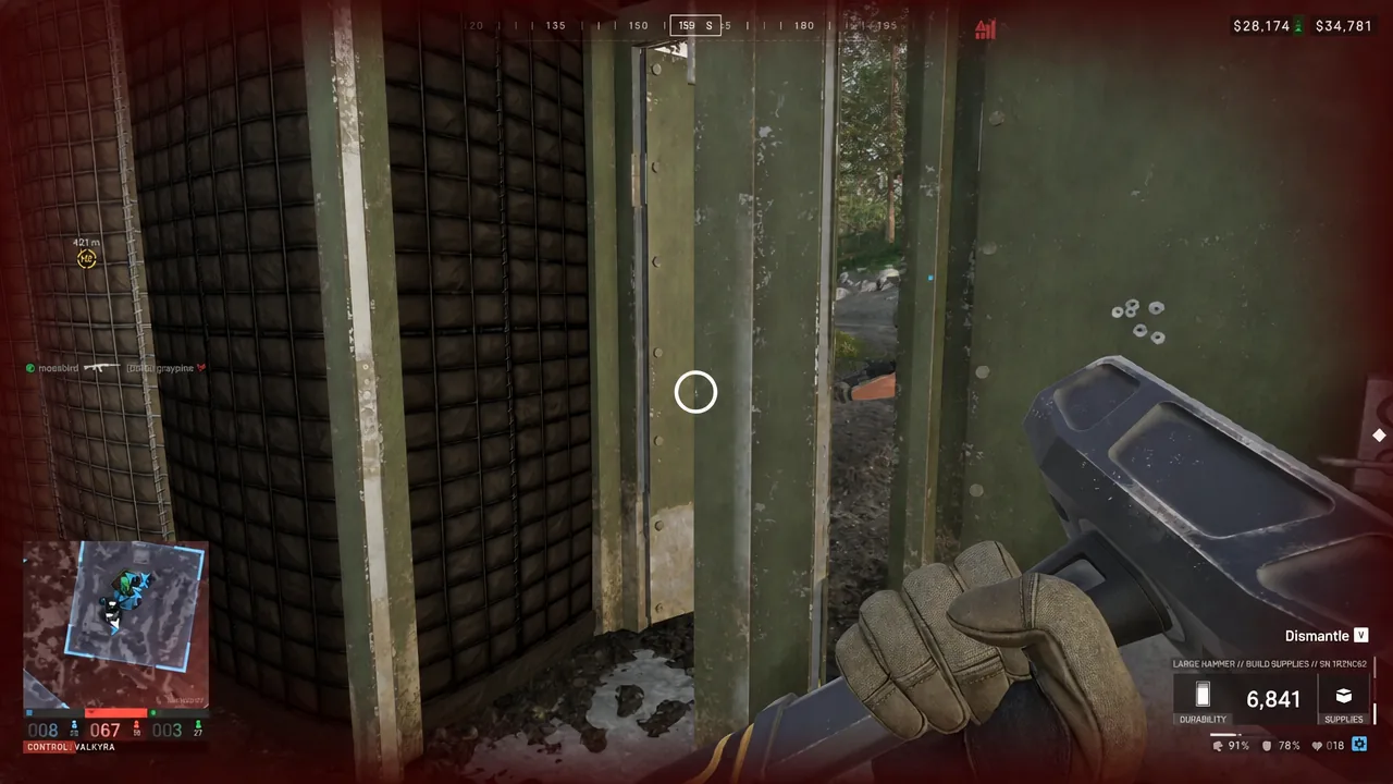 Dismantle action in progress on a structure while the player holds a Large Hammer