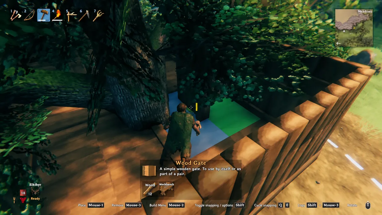 Build menu with Wood Gate highlighted and its placement preview lined up at the ladder opening